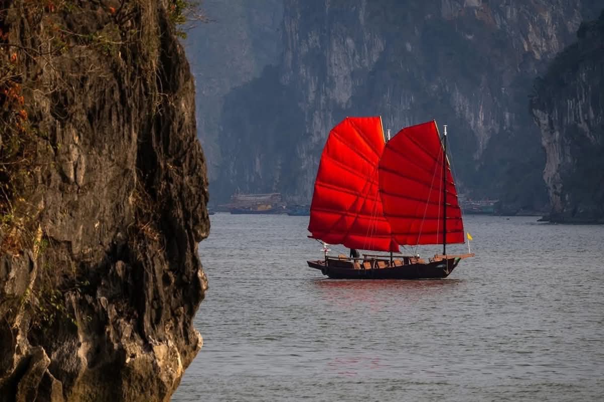 Red Sail Japanese Raft Red Sailboats in Halong Bay: Reviving a Traditional Maritime Icon